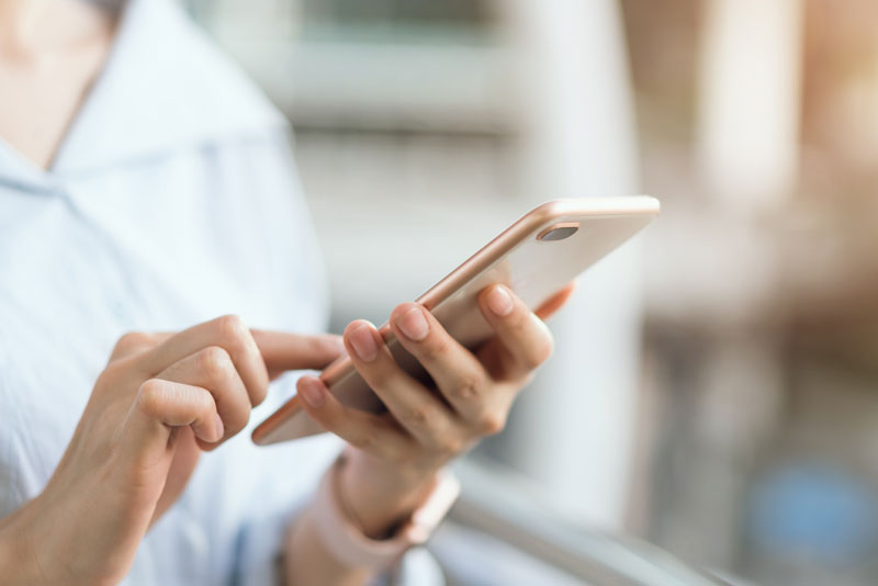 dental patient using a phone